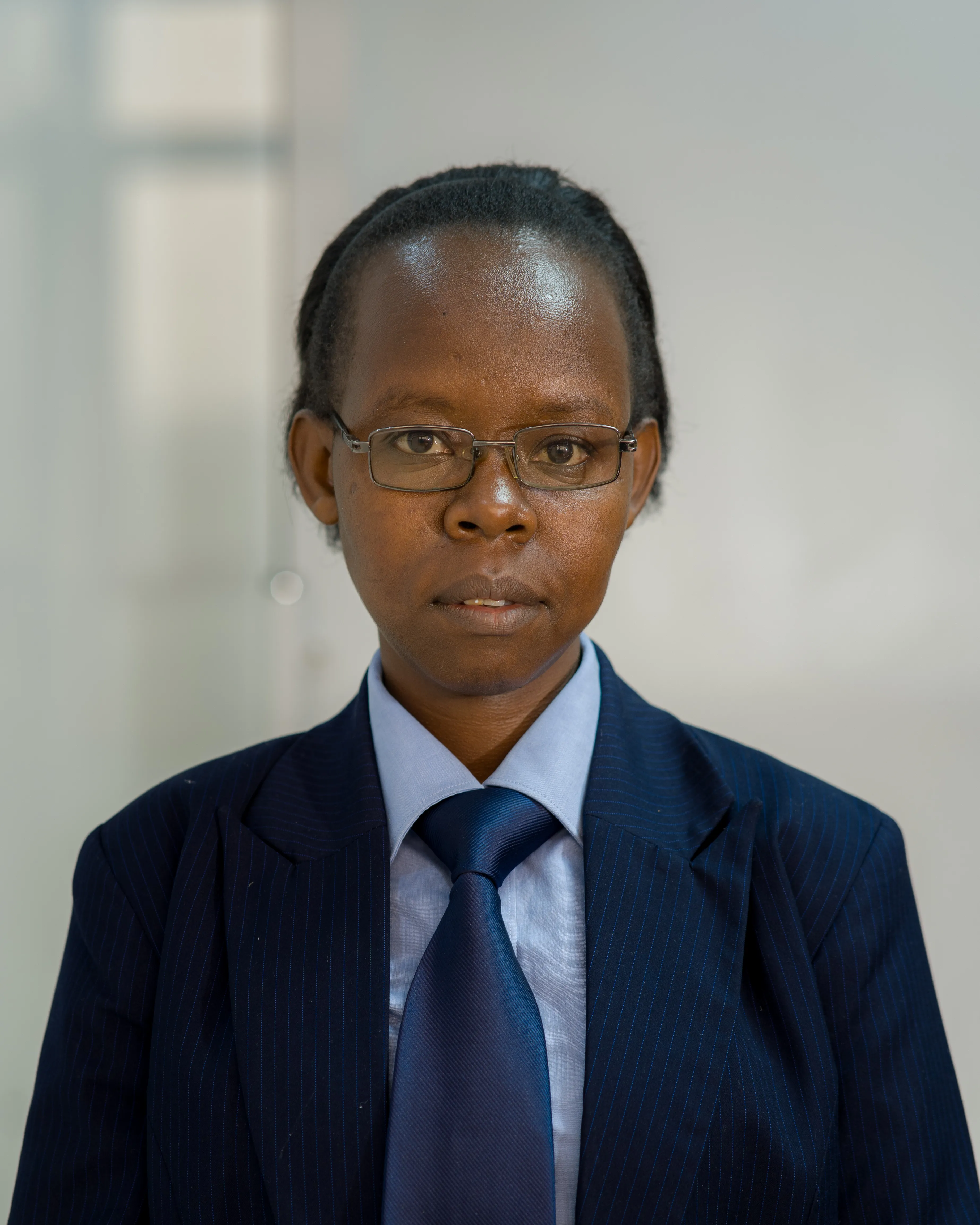 Mercy Nzisa — V.H. Law